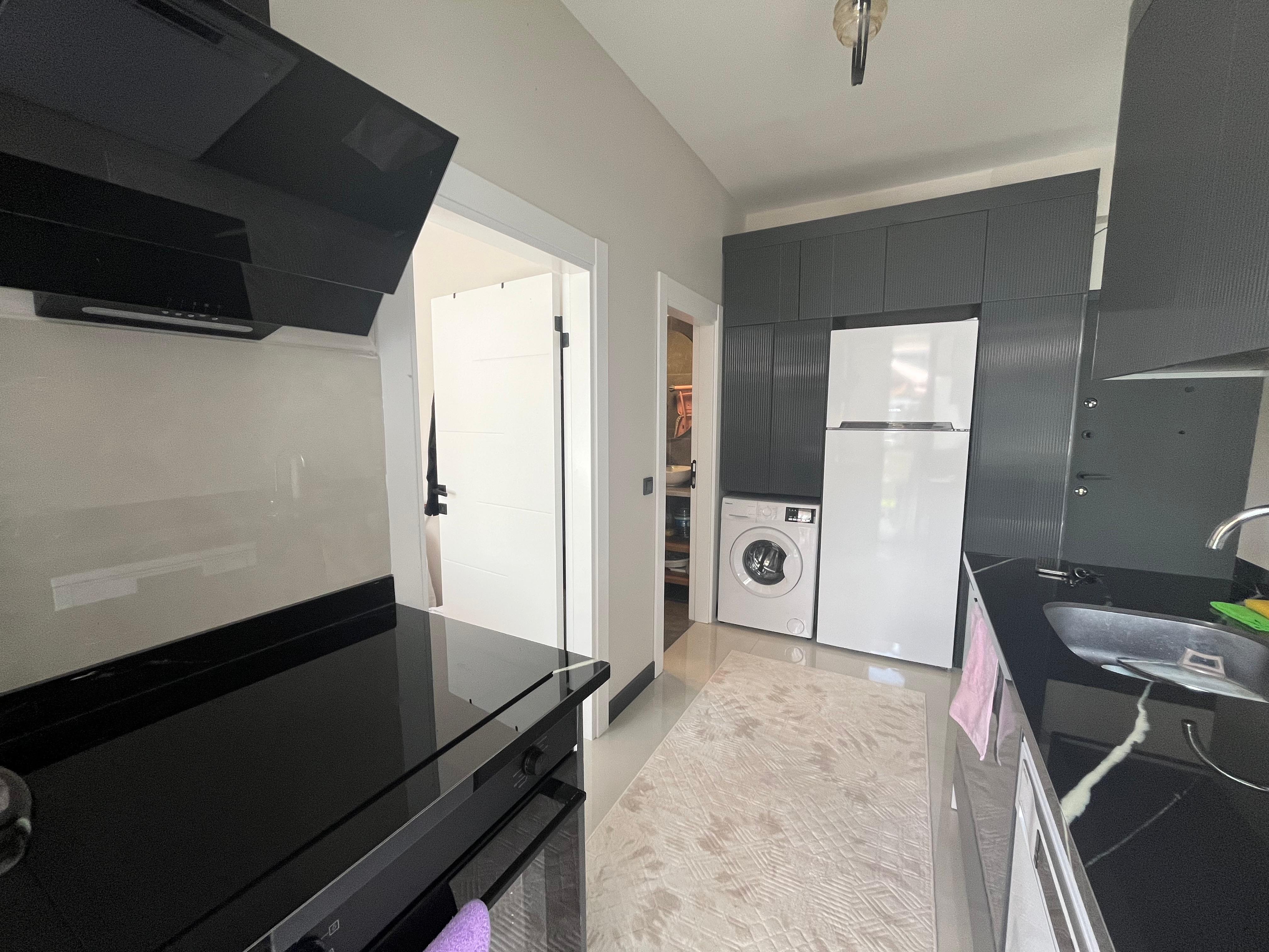 PURSAKLARDA MODERN YAŞAMIN KONFORLU HALİ SATILIK 1+1 - 12